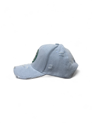 Blue distressed baseball cap on a white background