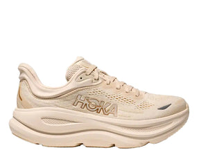 Beige running shoe with Hoka branding on a white background