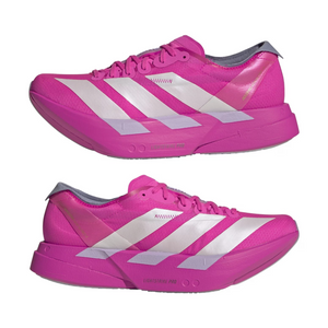 Pink athletic shoes with white stripes on a white background