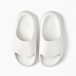Ludic Sliders in white are designed for muscle recovery.