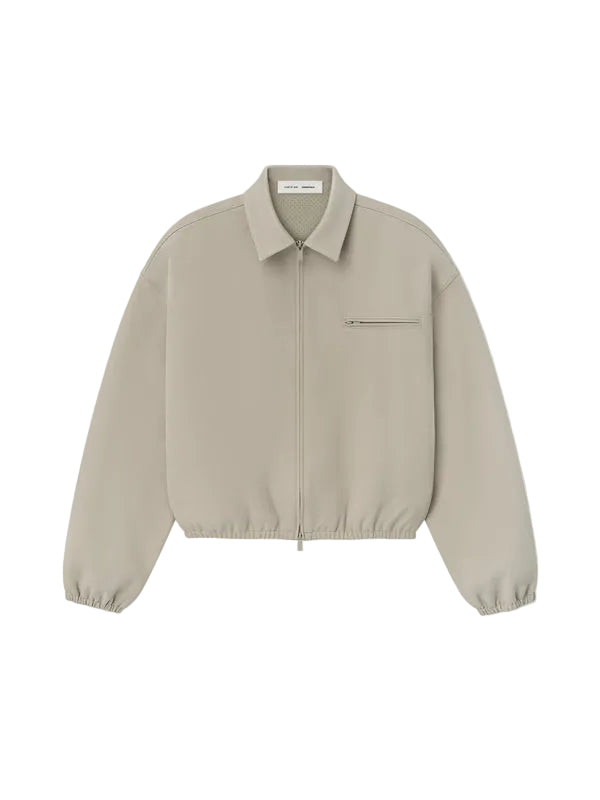 Beige jacket on a light beige background