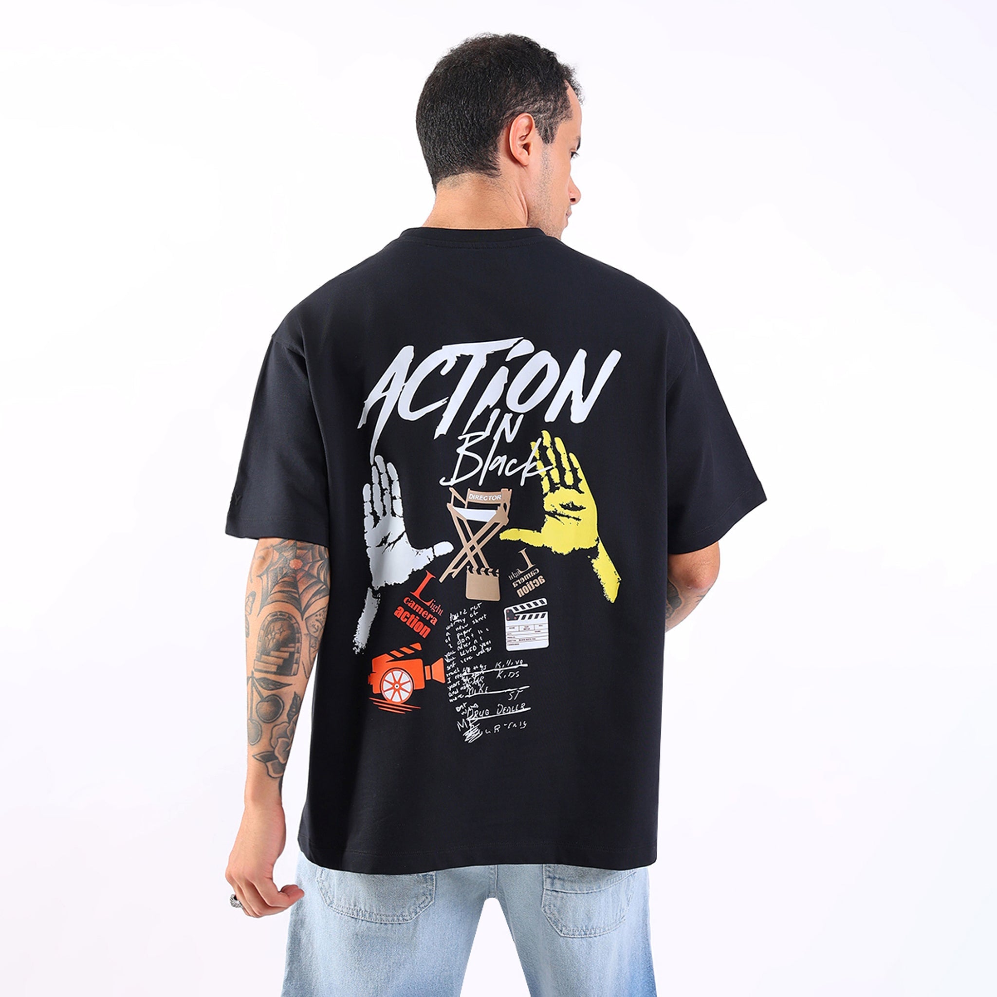 ACTION IN BLACK T-SHIRT