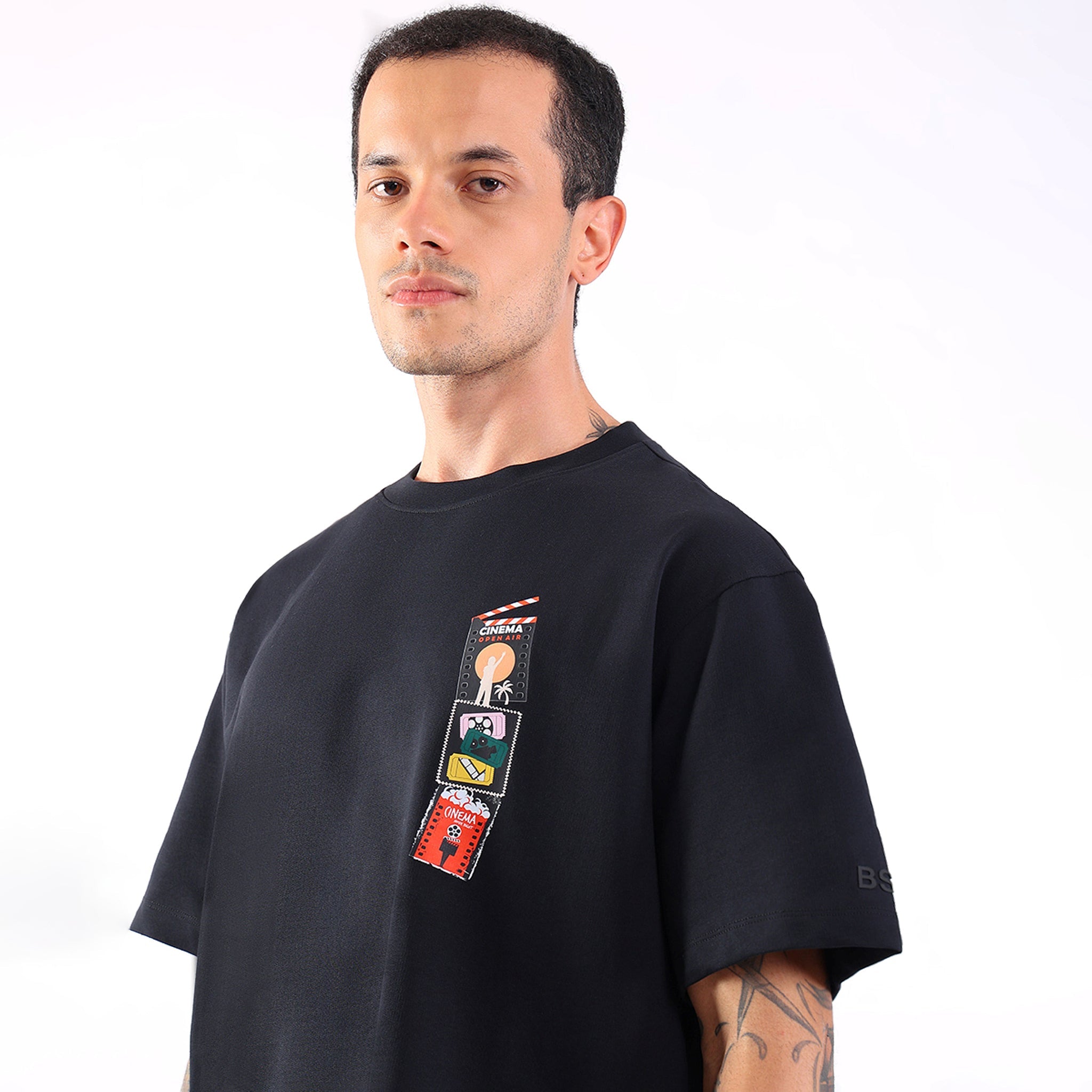 ACTION IN BLACK T-SHIRT