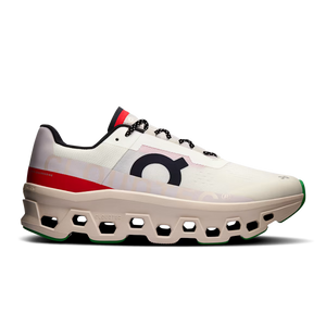 White athletic shoe with red and black accents on a white background