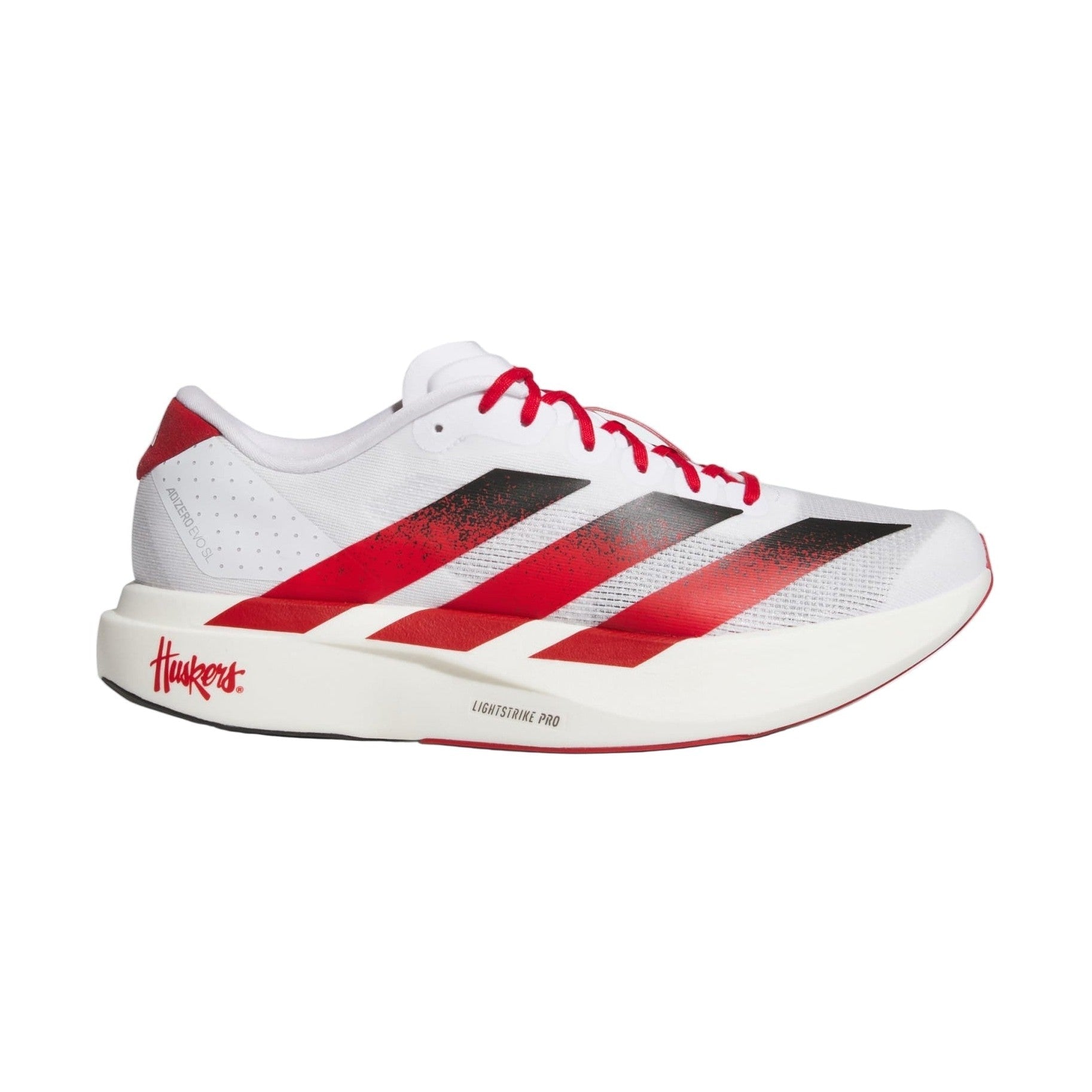 White and red running shoe with Adidas logo on a light gray background