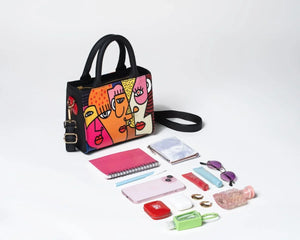 Colorful Vegan tote bag Mini FETTI Faces tote with accessories on a white background