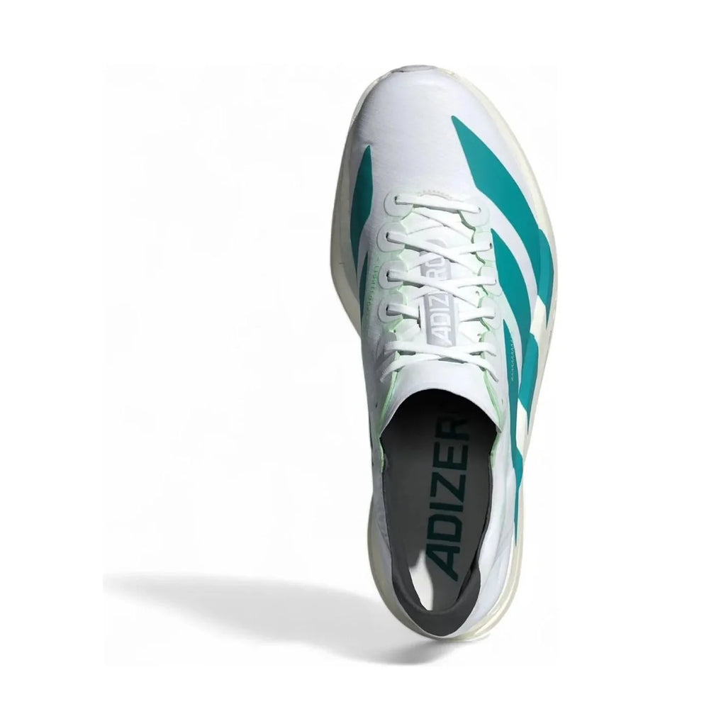 White and green sports shoe with 'Adizero' branding on a white background