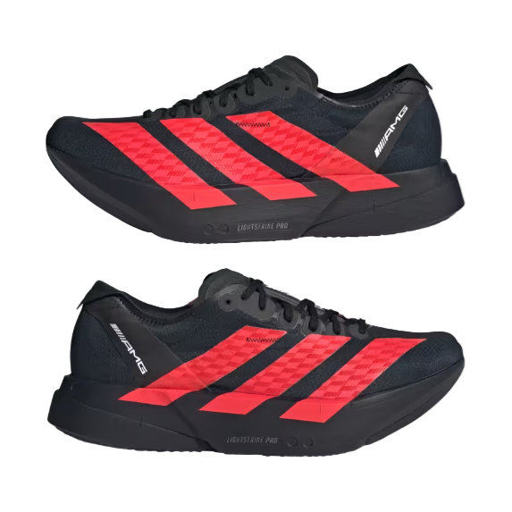 Black and red athletic shoes with quilted design on a light gray background