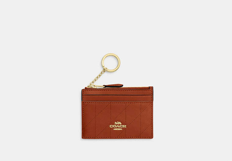 Mini Skinny ID Case In Signature Chenille - Gold/Cinnamon
