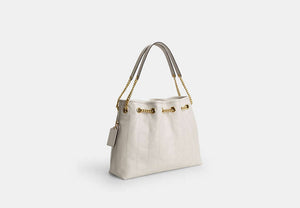 Evelyn Shoulder Bag With Quilting And Charm - Gold/Chalk