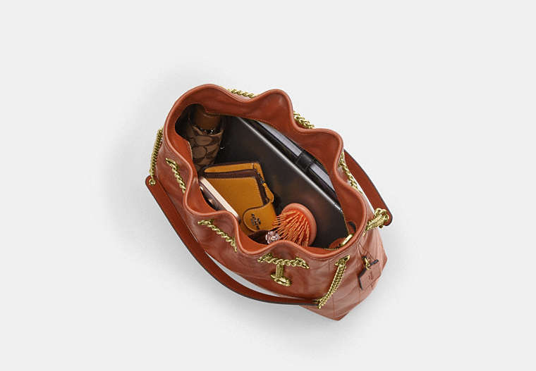 Evelyn Shoulder Bag With Quilting And Charm - Gold/Cinnamon