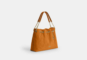 Evelyn Shoulder Bag With Quilting And Charm - Gold/Marigold