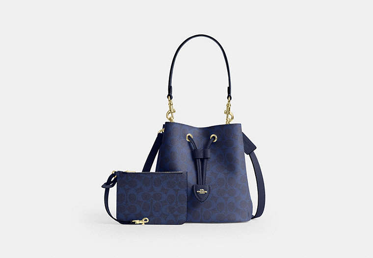 Rowan Bucket Bag In Signature Canvas - Gold/Navy