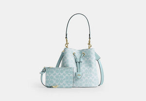 Rowan Bucket Bag In Signature Canvas - Gold/Light Blue