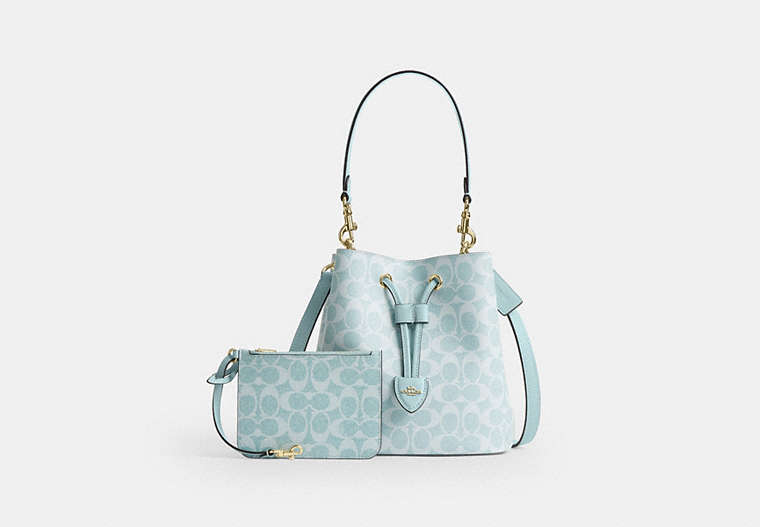 Rowan Bucket Bag In Signature Canvas - Gold/Light Blue
