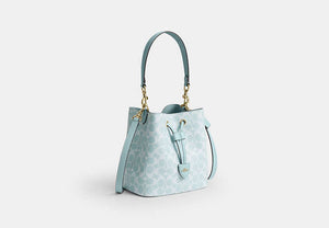 Rowan Bucket Bag In Signature Canvas - Gold/Light Blue
