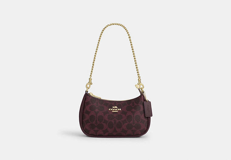 Teri Mini Crossbody Bag In Signature Canvas - Gold/Black Currant
