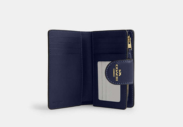 Medium Corner Zip Wallet In Signature Canvas - Gold/Navy