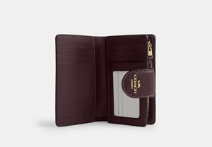 Medium Corner Zip Wallet In Signature Canvas - Gold/Black Currant