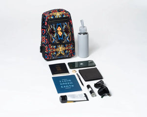 Colorful and stylish crossbody sling bag along with a water bottle, phone, notebook, and other items on a white background, showing the things it can easily hold inside.